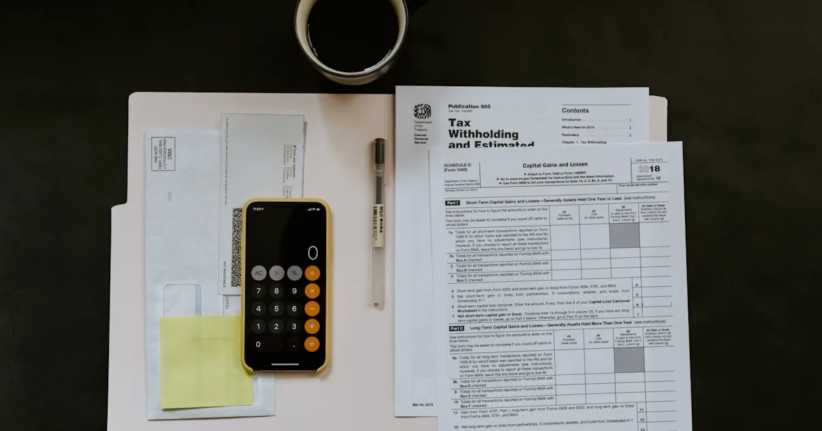Calculator and tax forms on a desk, standing in for Shopify tax settings

---

# content