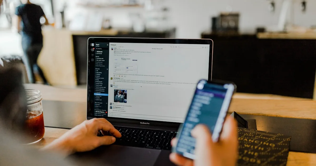 Laptop showing an email campaign editor beside a Shopify admin Marketing tab