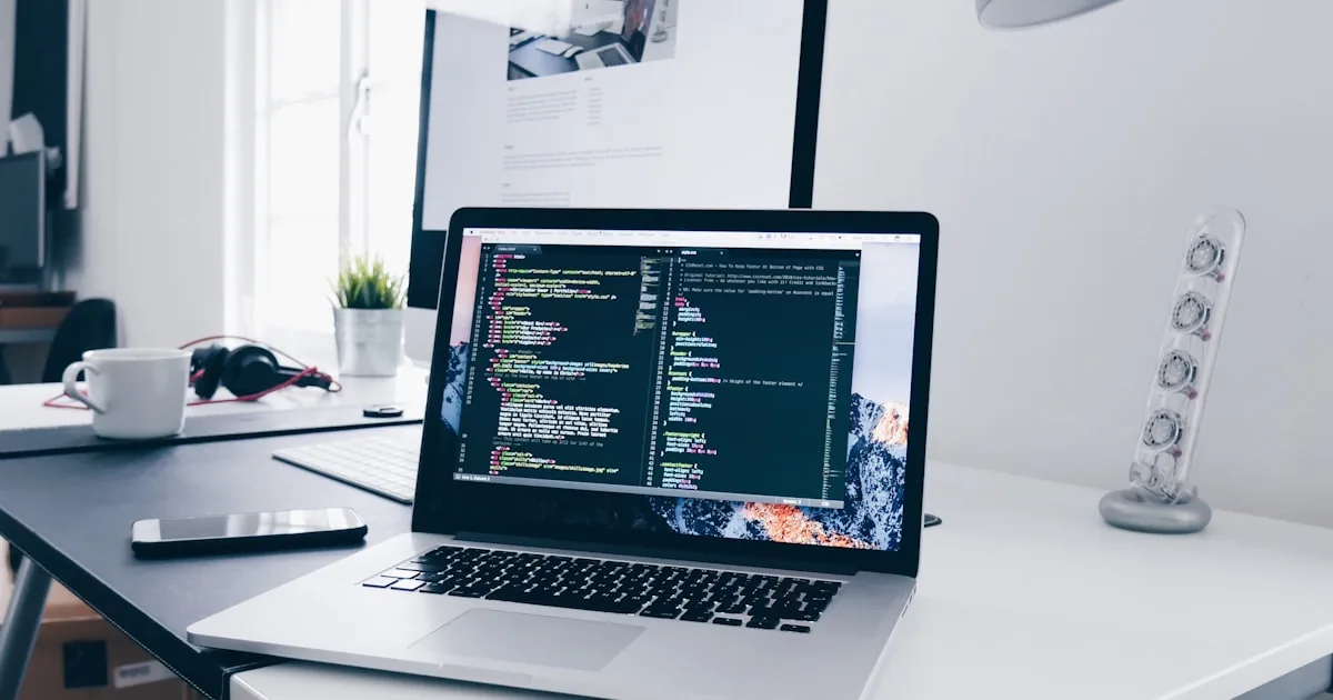Laptop showing a storefront URL bar and HTTPS lock, standing in for Shopify technical SEO checks