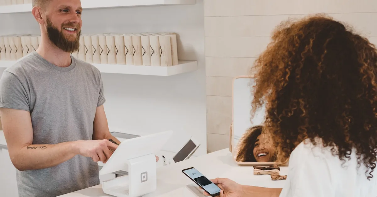 Retail checkout counter with card terminal, standing in for choosing an ecommerce platform